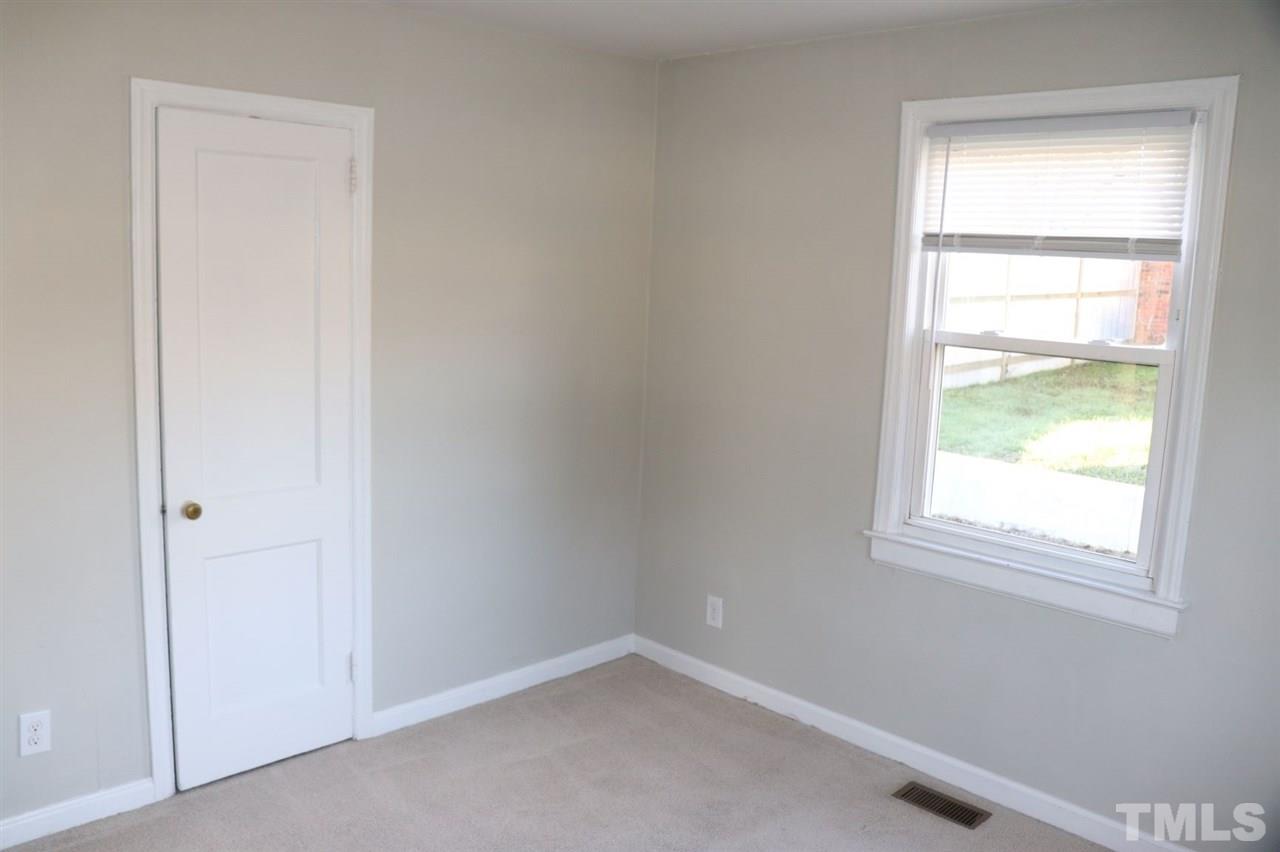 2110 Tudor Place Raleigh, NC 27610 - Photo 9 of 17 an empty room with a window