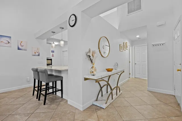 a view of a table and chairs in a room