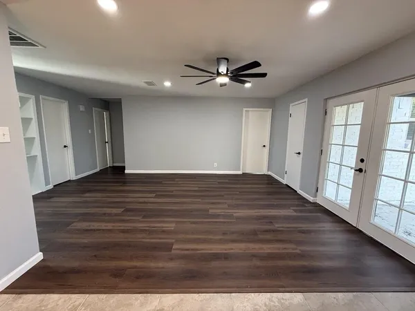 a kitchen with a sink stainless steel appliances and cabinets