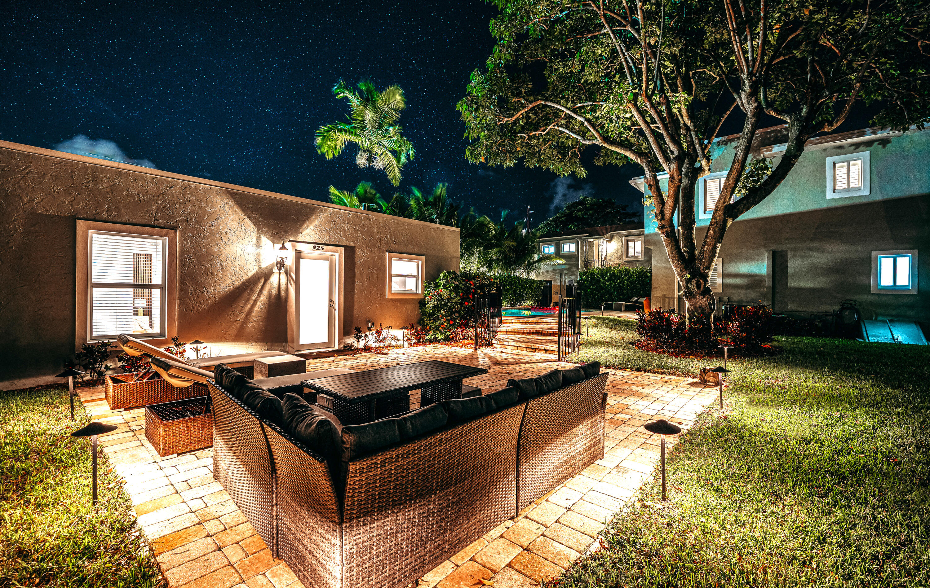 921 Ortega Road West Palm Beach, FL 33405 - Photo 52 of 60 a view of a house with swimming pool and sitting area