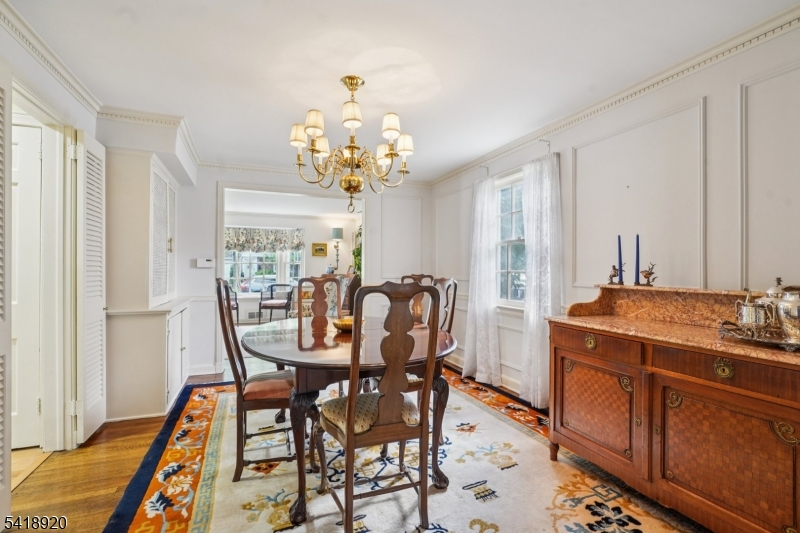 66 Springbrook Road Springfield, NJ 07081 - Photo 12 of 38 a view of a dining room with furniture and chandelier