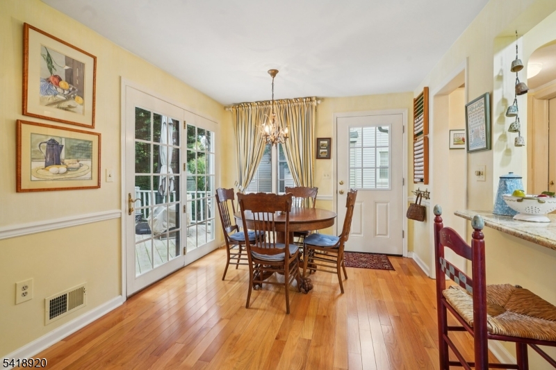 66 Springbrook Road Springfield, NJ 07081 - Photo 14 of 38 a view of a dining room with furniture window and wooden floor