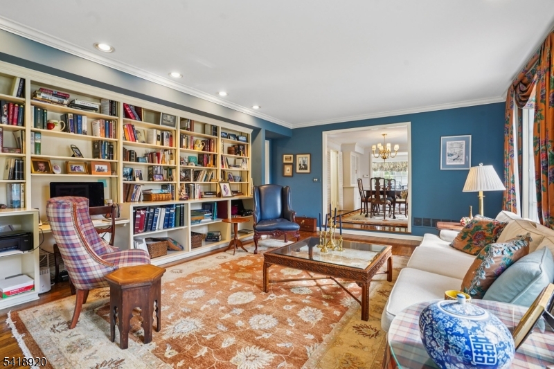 66 Springbrook Road Springfield, NJ 07081 - Photo 21 of 38 a living room with fireplace furniture and a large window