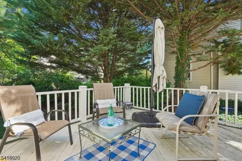 a view of porch with a furniture