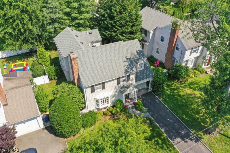 66 Springbrook Road Springfield, NJ 07081 - Photo 4 of 38 an aerial view of a house with garden space and a street view