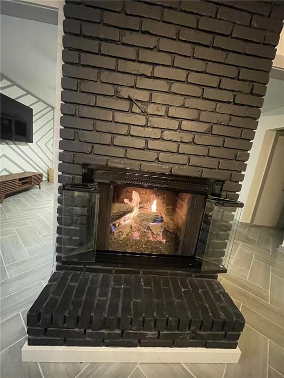 1944 Cindy Drive Decatur, GA 30032 - Photo 8 of 22 a view of fireplace with wooden floor