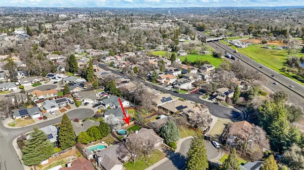 an aerial view of a city with lots of residential buildings