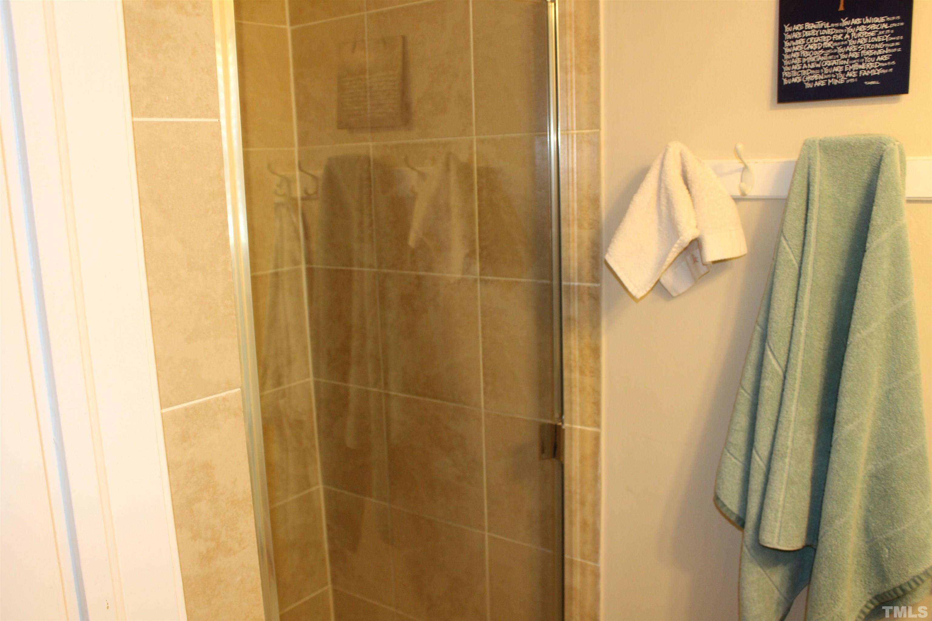 2248 The Circle, Unit 2 Raleigh, NC 27608 - Photo 12 of 21 a bathroom with a shower
