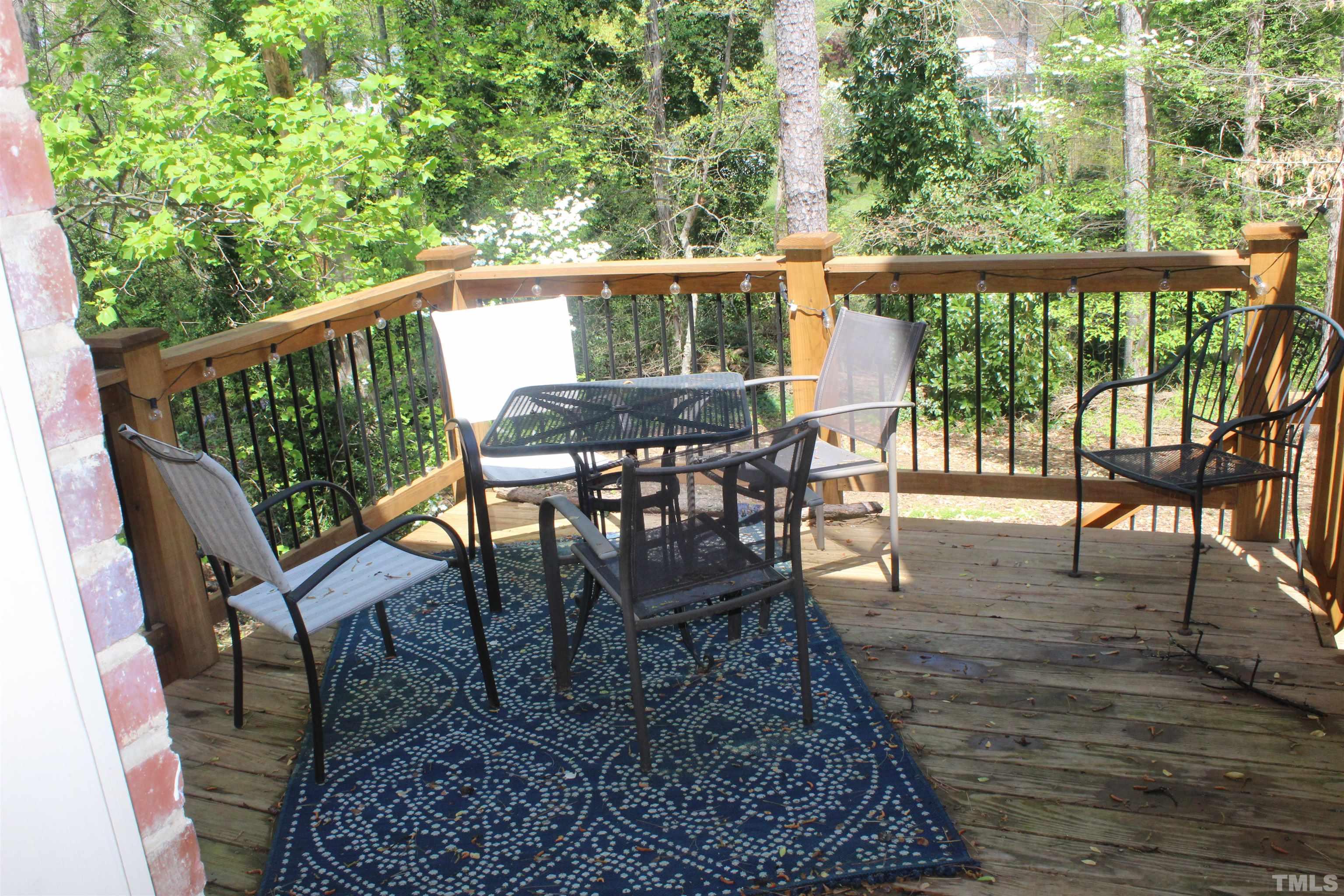 2248 The Circle, Unit 2 Raleigh, NC 27608 - Photo 13 of 21 a view of a chairs and table on the wooden floor