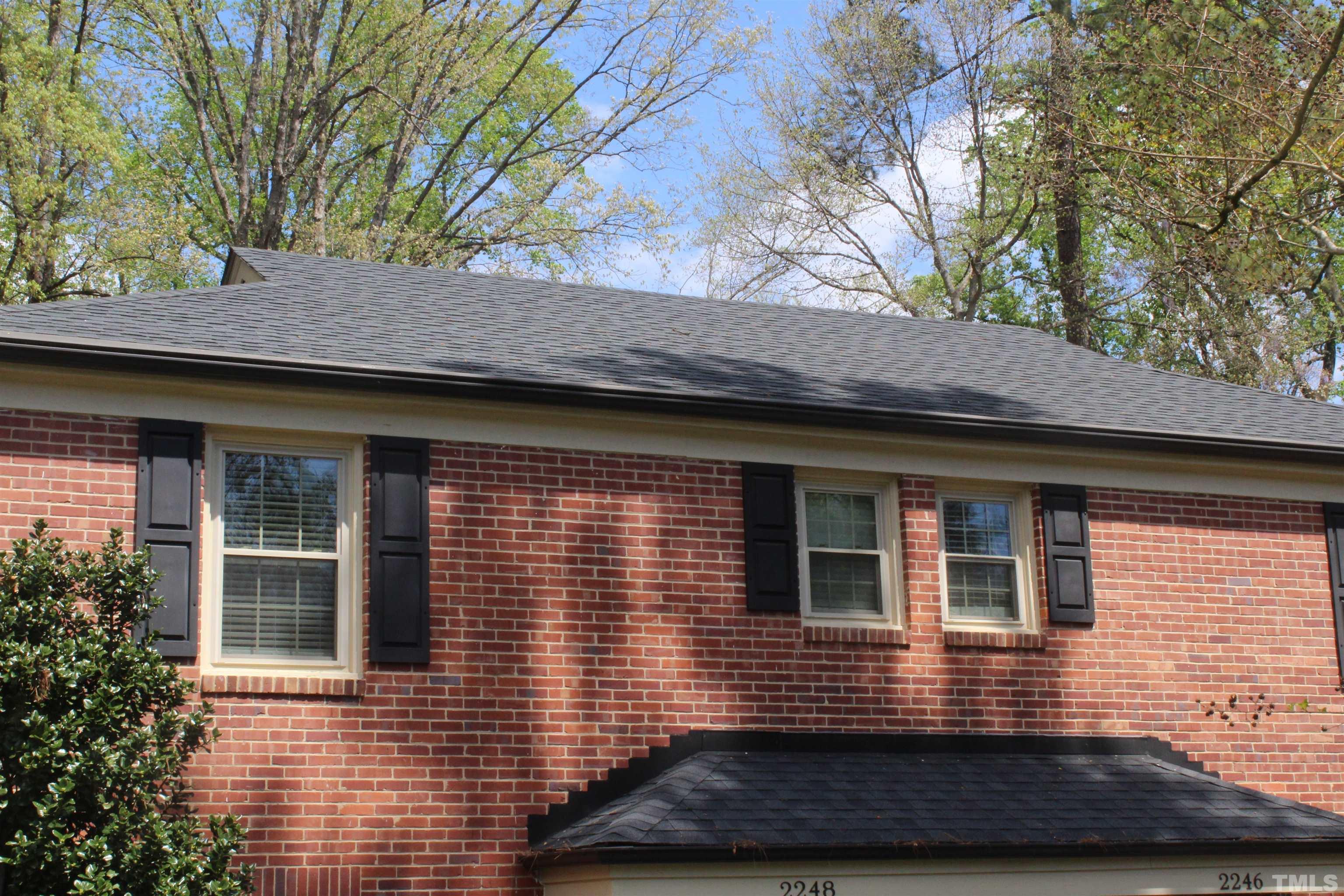2248 The Circle, Unit 2 Raleigh, NC 27608 - Photo 16 of 21 a view of house with tree