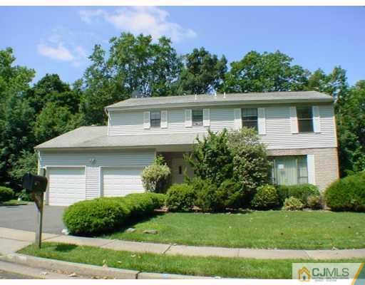 21 Churchill Road Edison, NJ 08820 - Photo 1 of 1 a view of a house with a yard