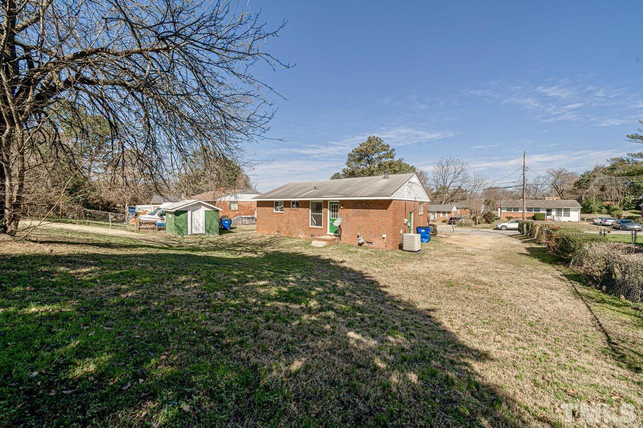 828 Newcombe Road Raleigh, NC 27610 - Photo 5 of 24 a view of a town with barn house