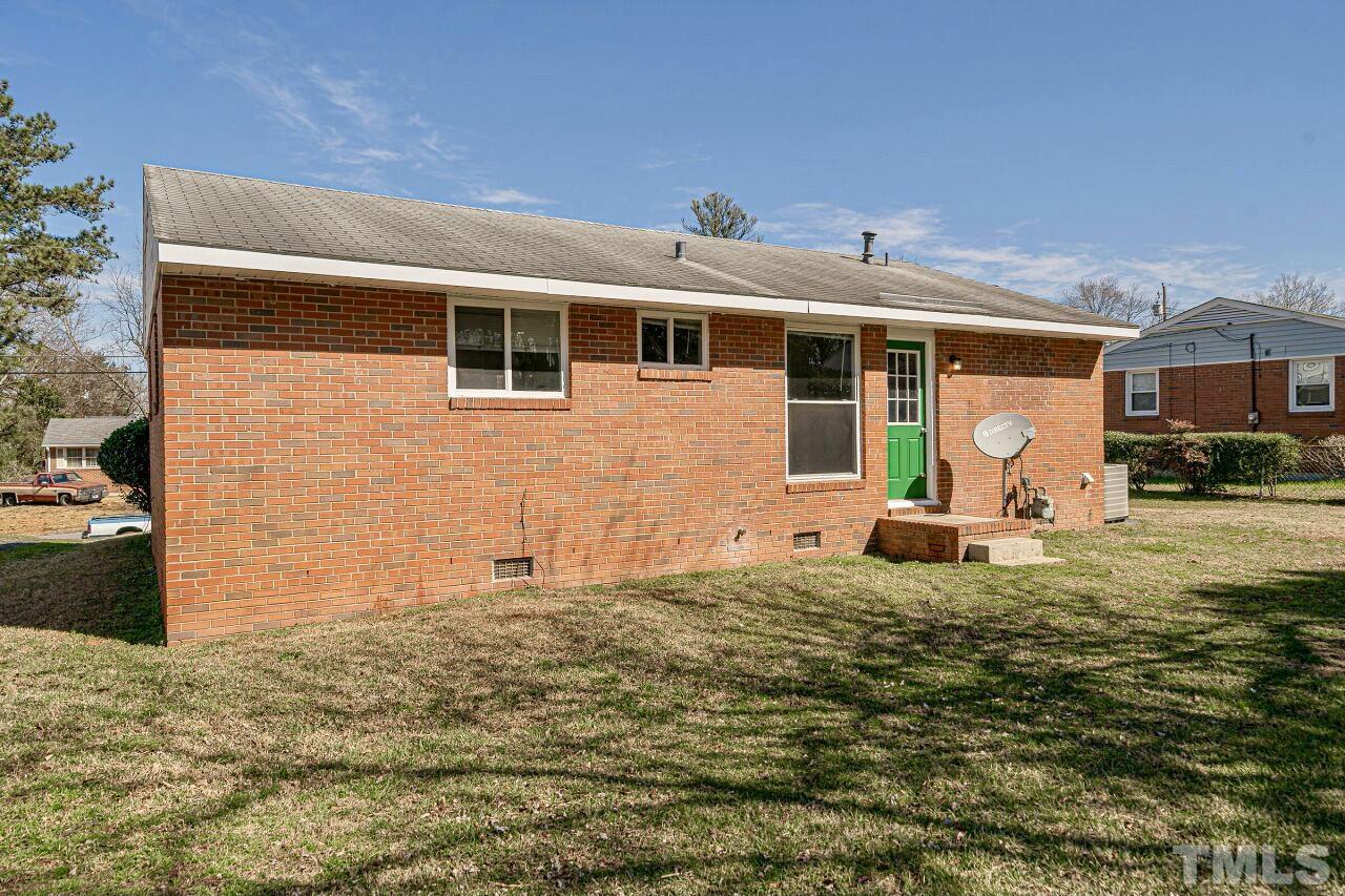 828 Newcombe Road Raleigh, NC 27610 - Photo 8 of 24 a front view of a house with garden