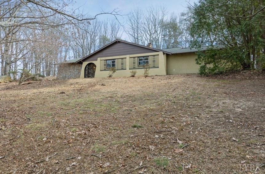 1180 David Giles Lane Blairs, VA 24527 - Photo 4 of 34 a front view of house with yard and trees around