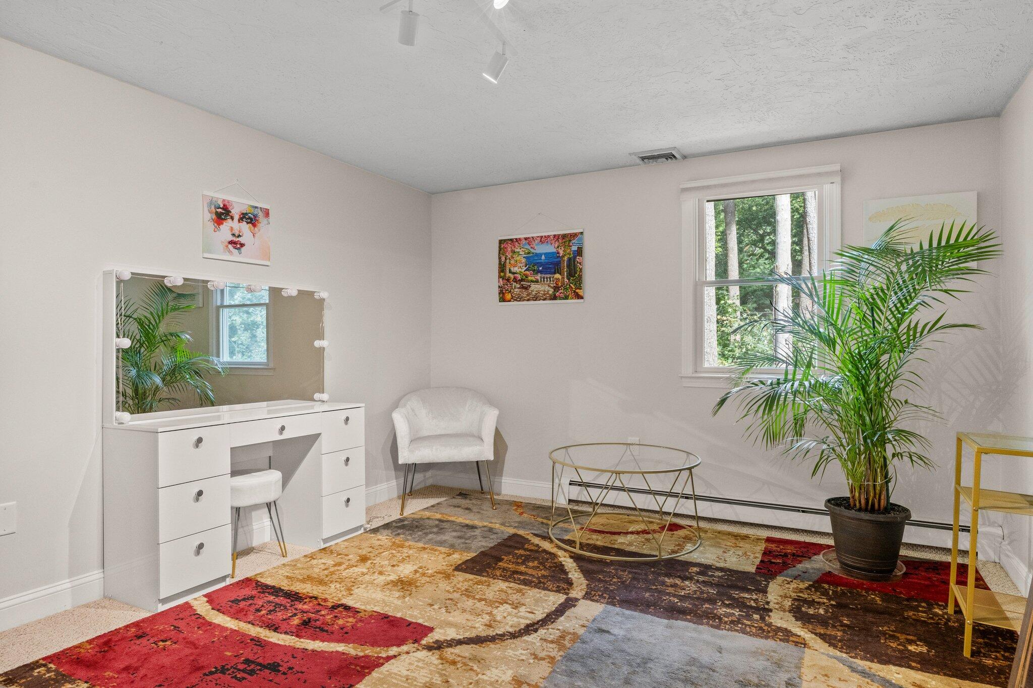 28 Brook Street Plympton, MA 02367 - Photo 34 of 57 a living room with furniture and a potted plant