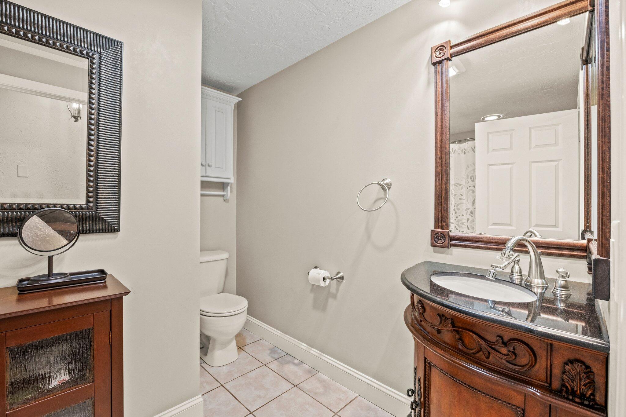 28 Brook Street Plympton, MA 02367 - Photo 37 of 57 a bathroom with a sink a toilet and a mirror