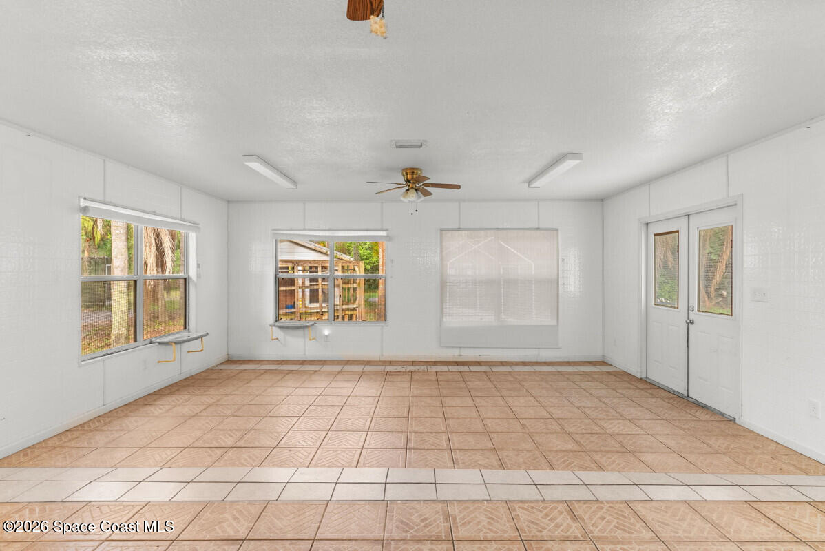 2493 Adamson Road Cocoa, FL 32926 - Photo 22 of 46 a view of an empty room with a window