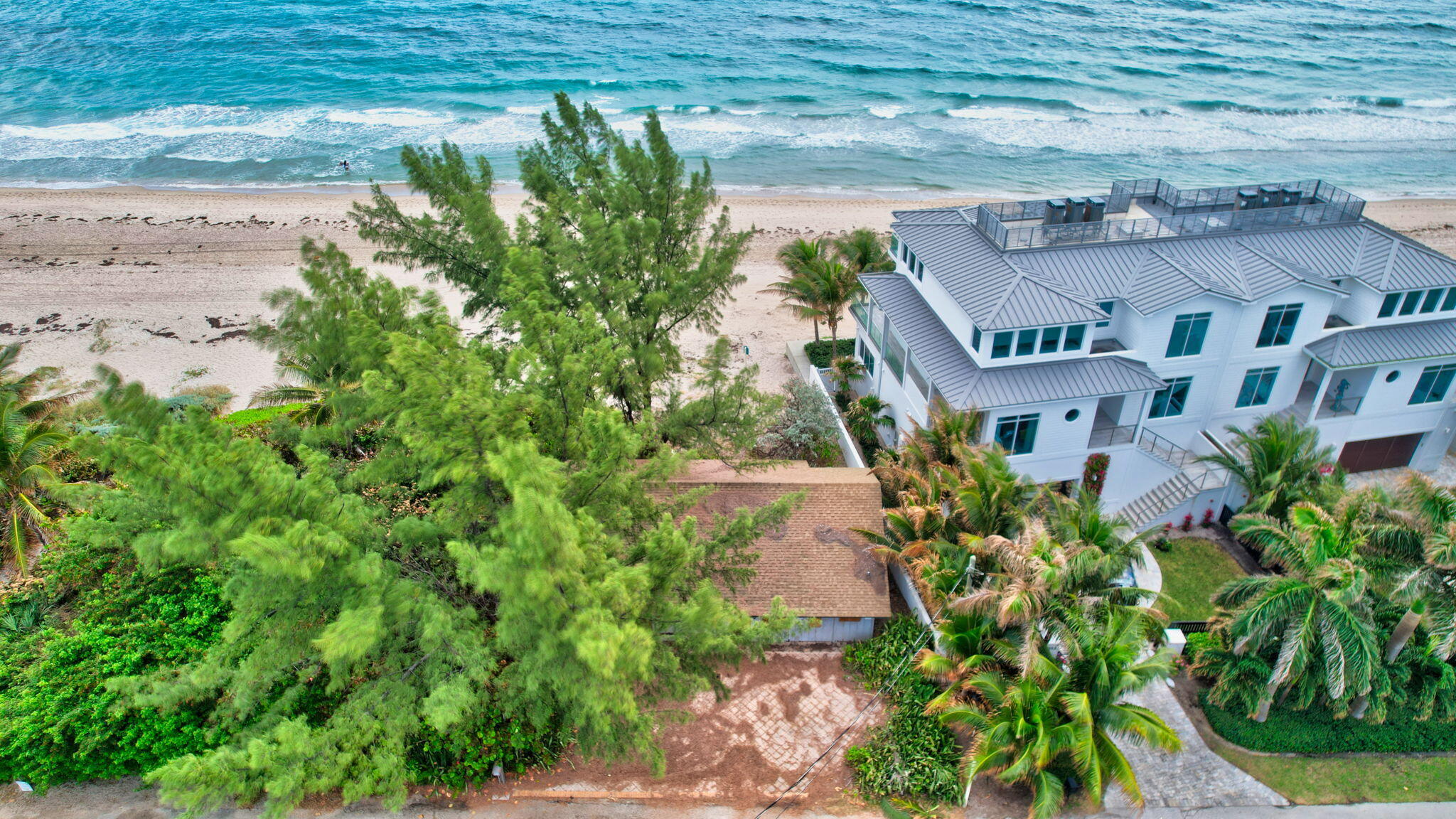 5015 Old Ocean Boulevard Ocean Ridge, FL 33435 - Photo 6 of 45 an aerial view of a house with a yard