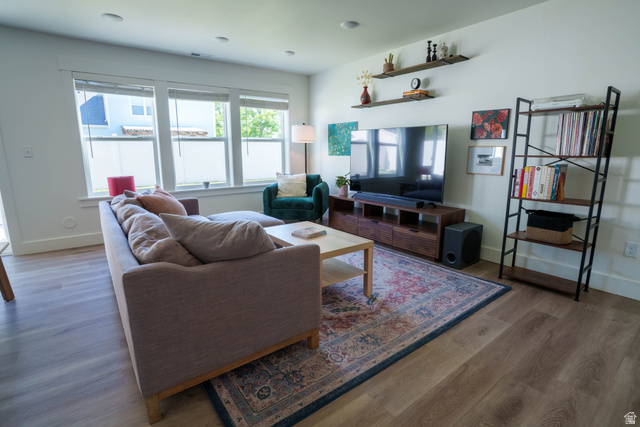 1486 West 2055th Street South Logan, UT 84339 - Photo 7 of 45 Bright living space featuring light wood-finish flooring