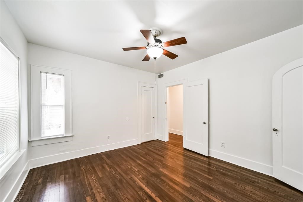 2235 Welch Street Houston, TX 77019 - Photo 15 of 18 a view of empty room with wooden floor and fan