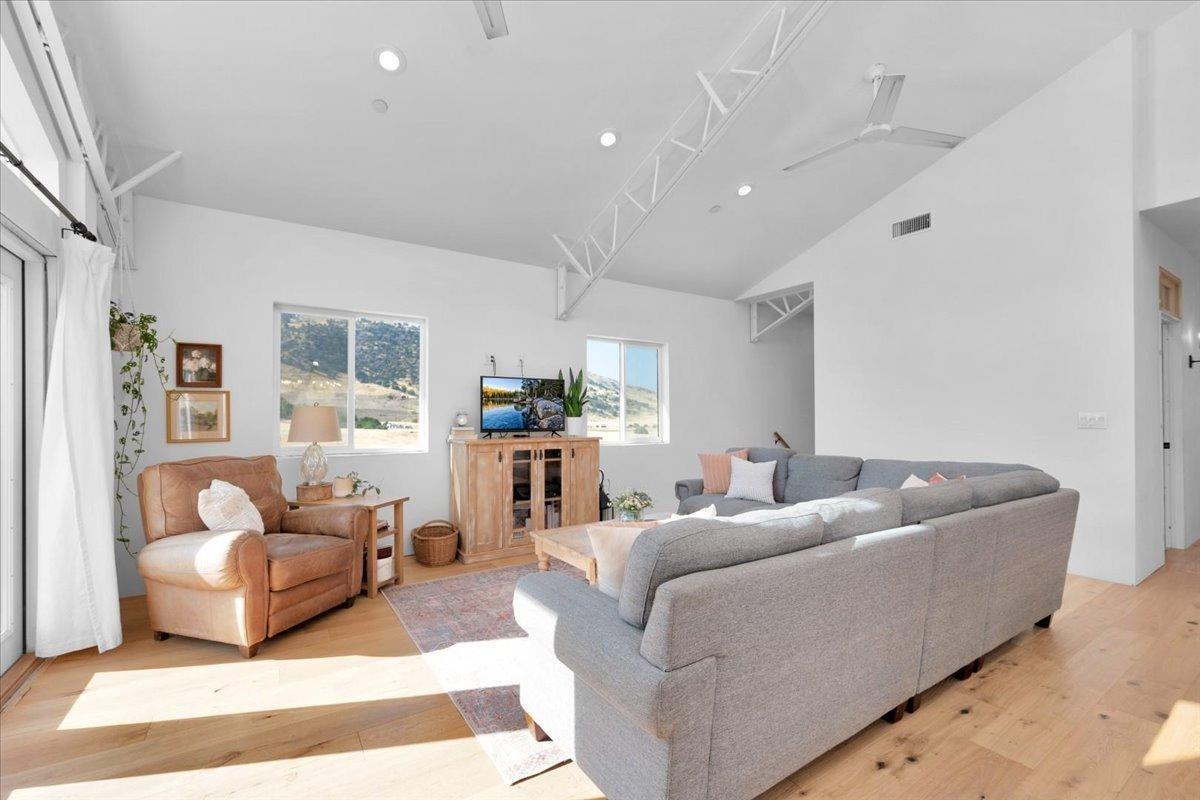22654 Cobblestone Lane Sanger, CA 93657 - Photo 17 of 64 a living room with furniture and a rug