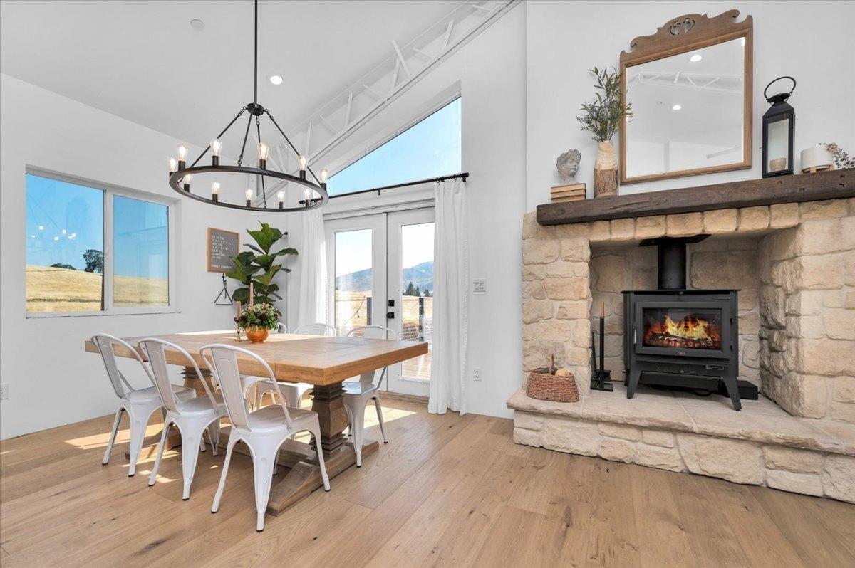 22654 Cobblestone Lane Sanger, CA 93657 - Photo 19 of 64 a view of a dining room with furniture window and wooden floor
