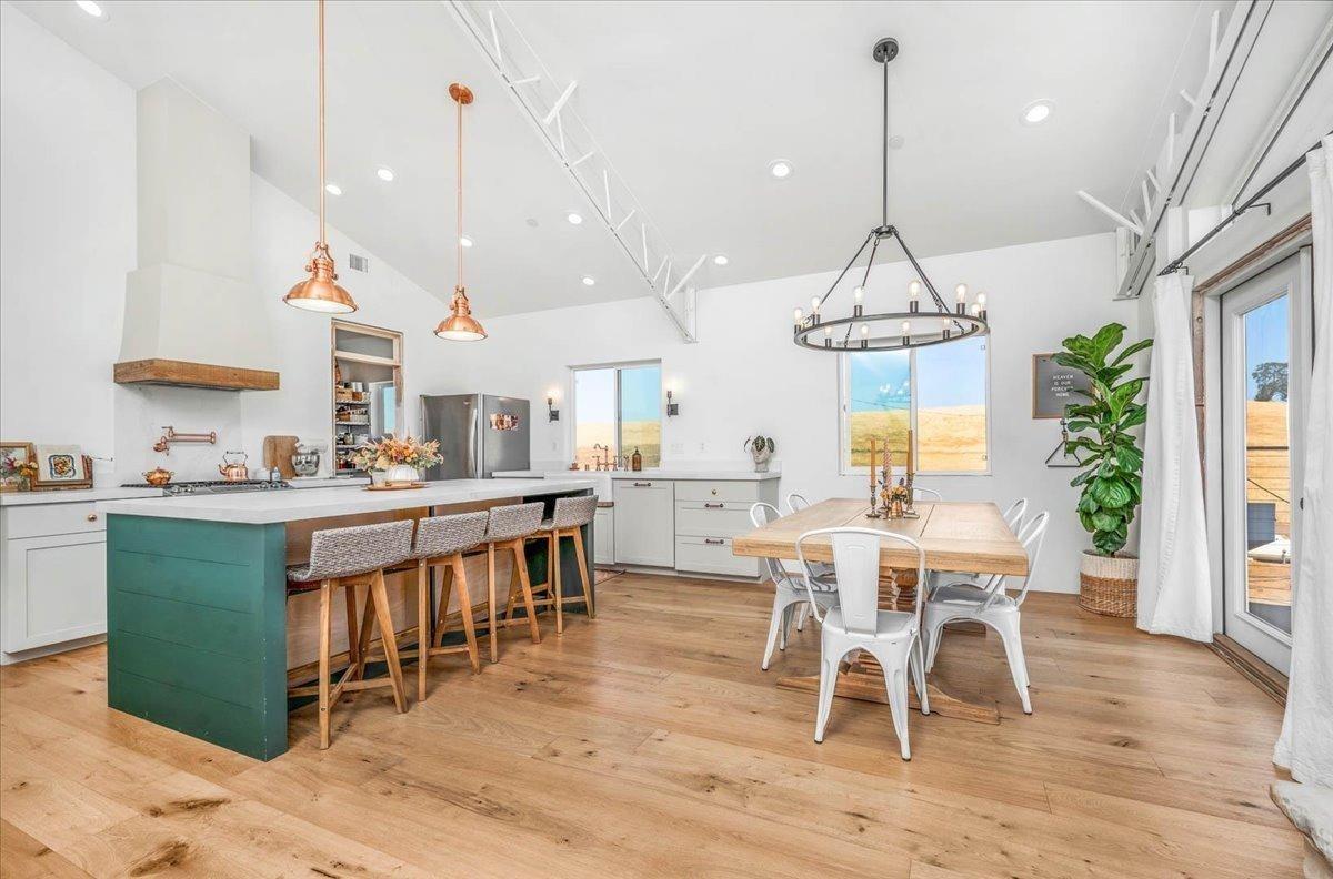 22654 Cobblestone Lane Sanger, CA 93657 - Photo 22 of 64 a view of kitchen with sink and dining table