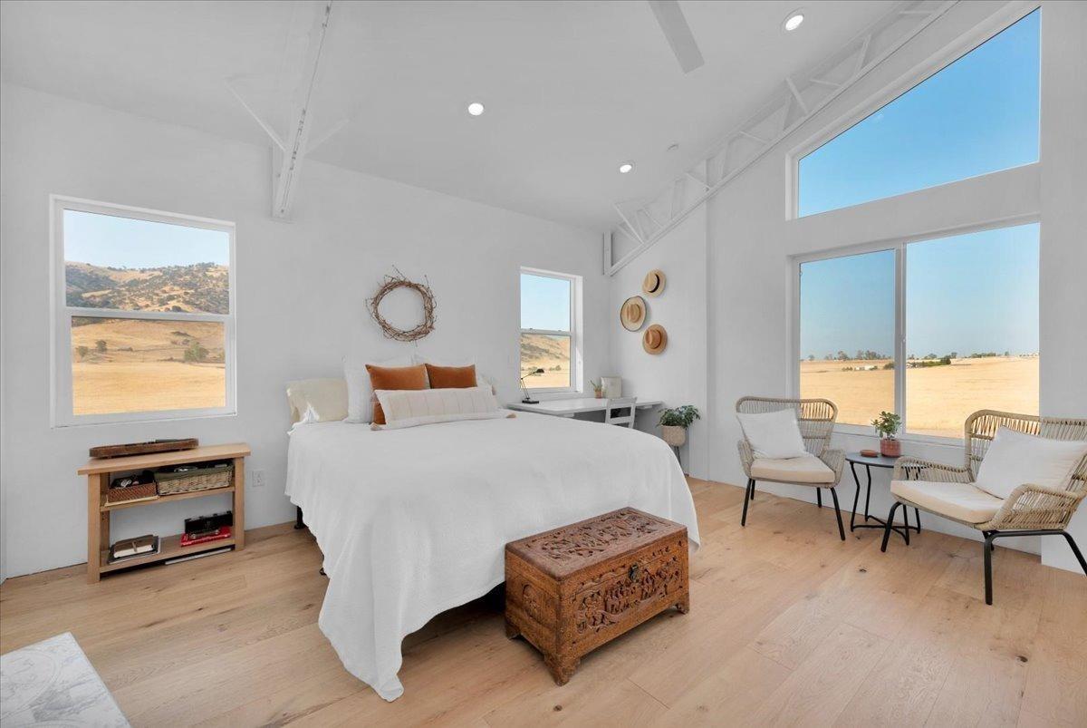 22654 Cobblestone Lane Sanger, CA 93657 - Photo 29 of 64 a bed room with furniture and a window