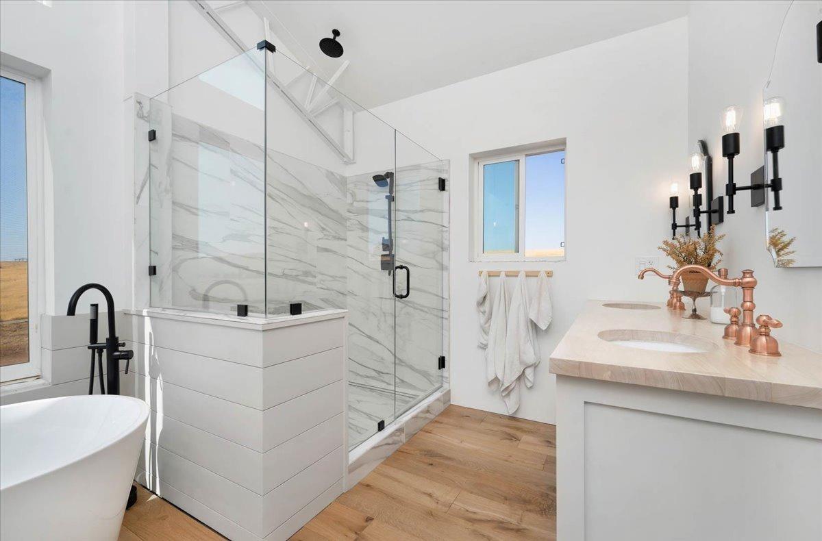 22654 Cobblestone Lane Sanger, CA 93657 - Photo 32 of 64 a bathroom with a sink a toilet and shower