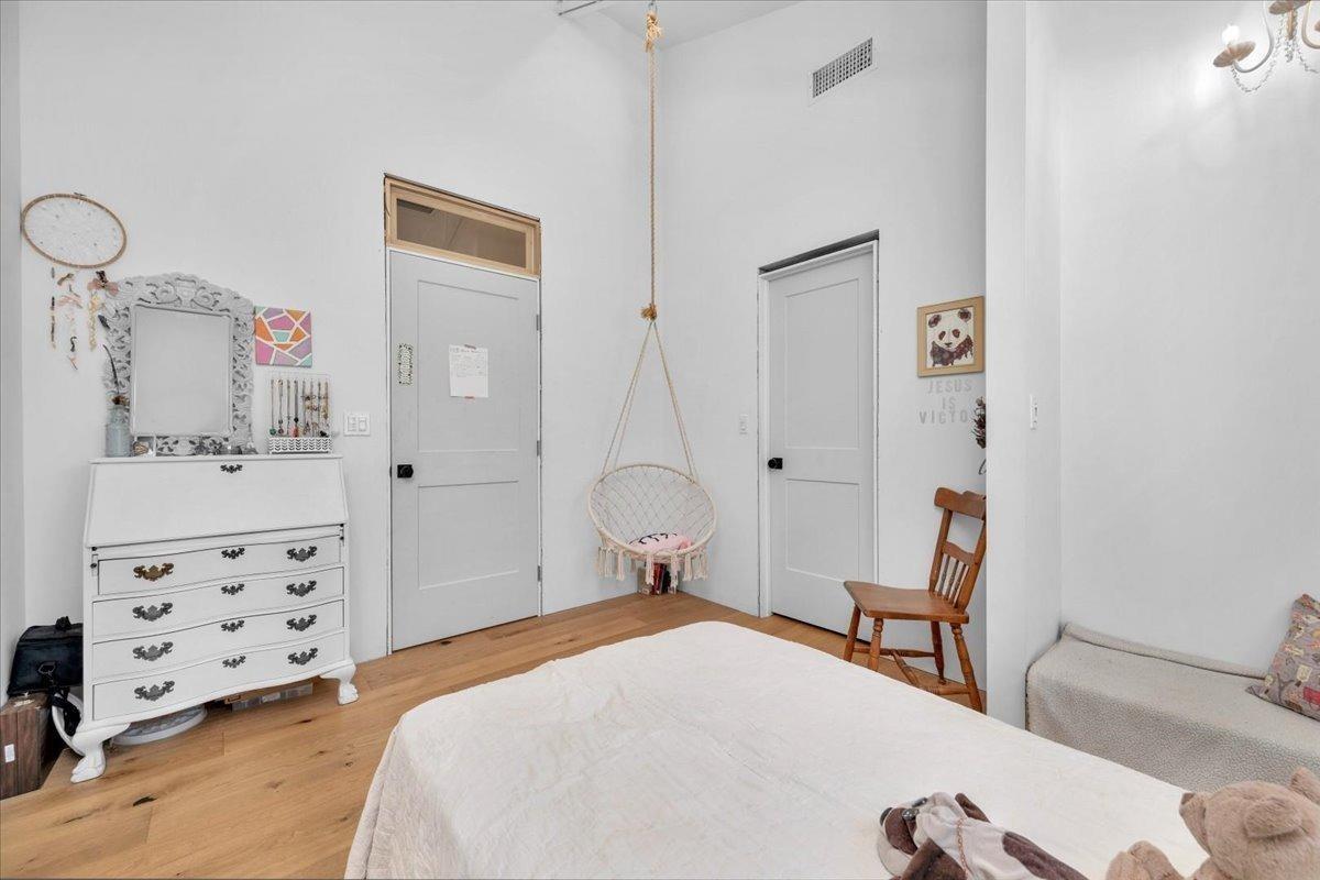 22654 Cobblestone Lane Sanger, CA 93657 - Photo 38 of 64 a bedroom with a bed and furniture