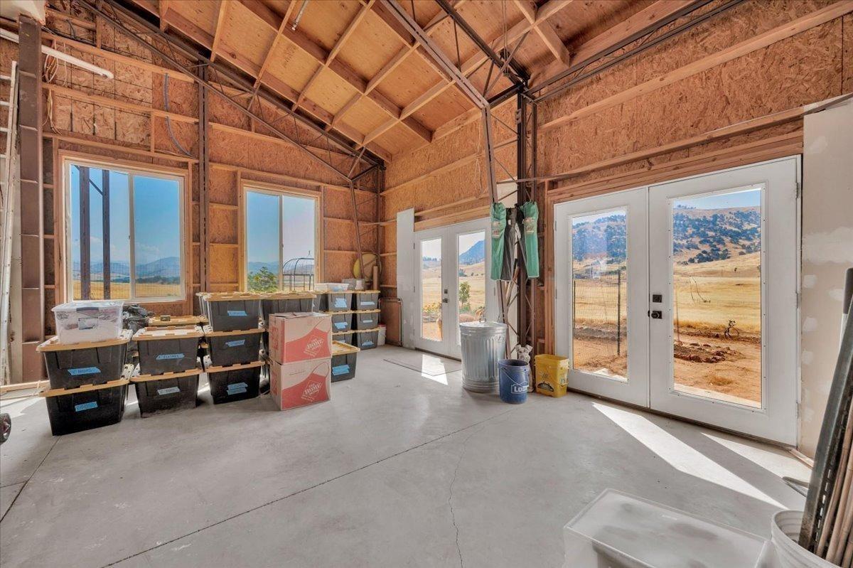 22654 Cobblestone Lane Sanger, CA 93657 - Photo 49 of 64 a view of a room with cars parked