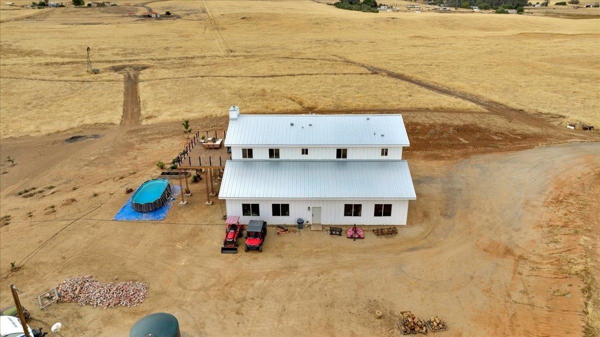 22654 Cobblestone Lane Sanger, CA 93657 - Photo 5 of 64 a view of houses with outdoor space