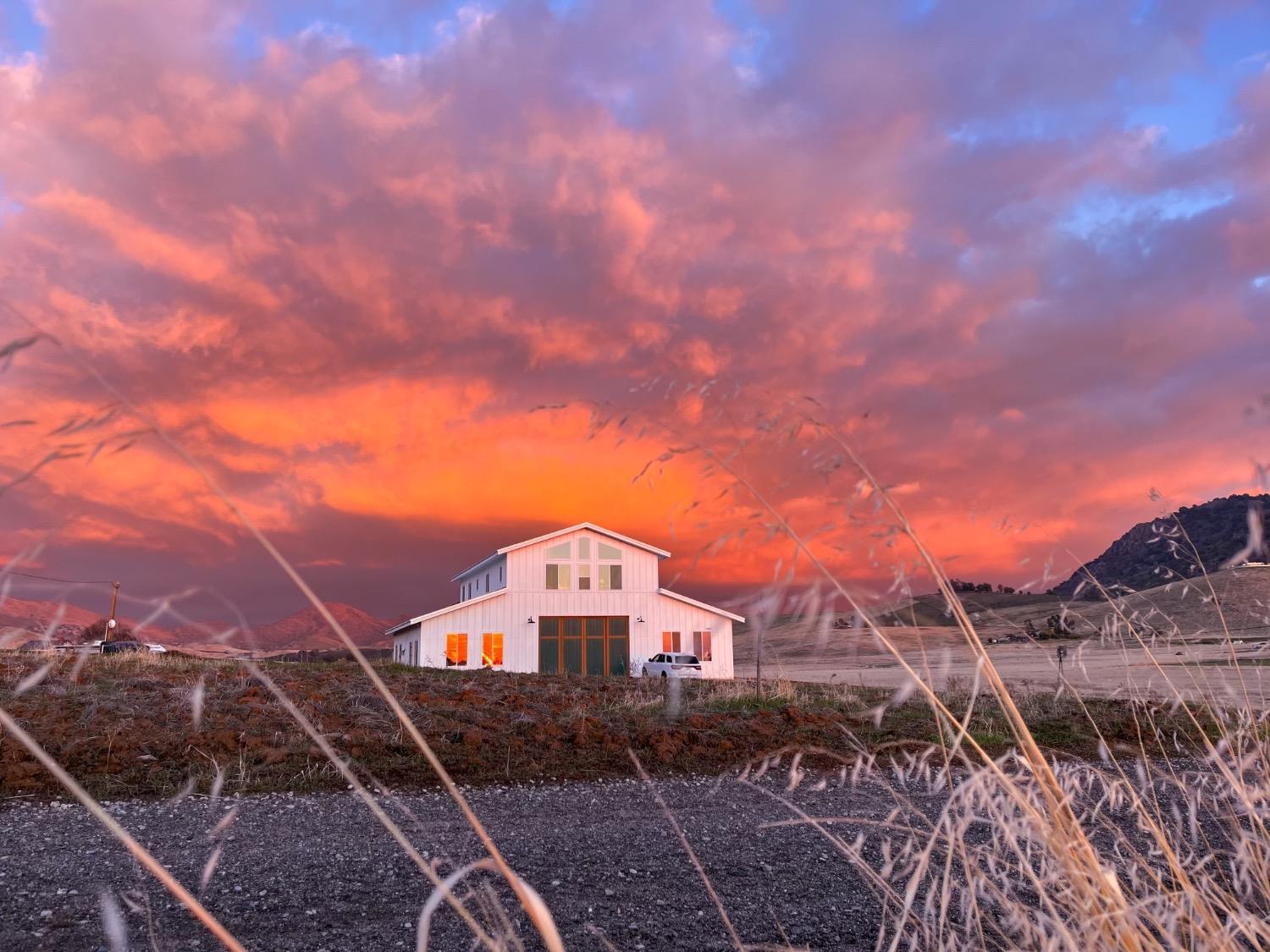 22654 Cobblestone Lane Sanger, CA 93657 - Photo 64 of 64 a view of a house with a yard