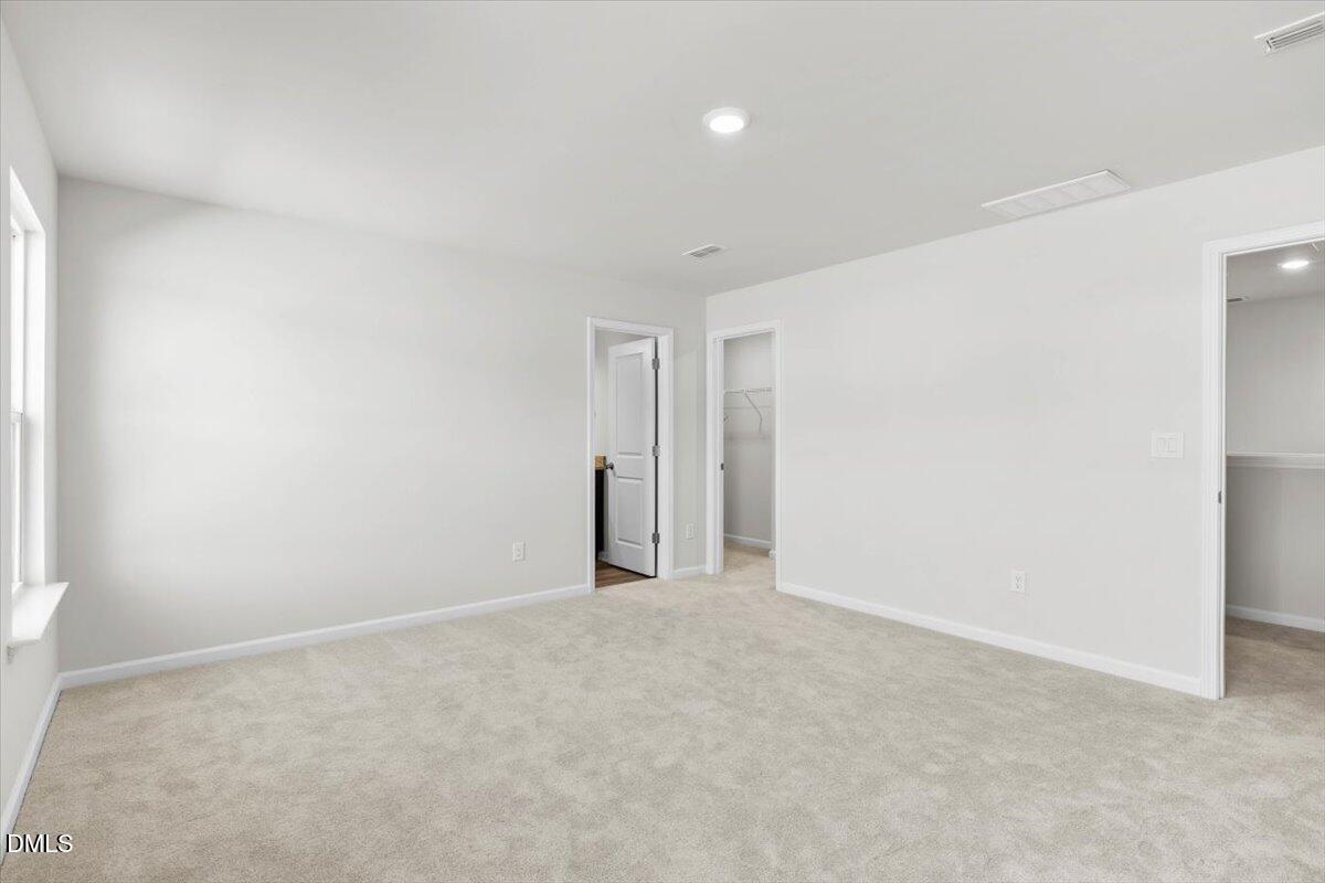 1387 Hasse Avenue Apex, NC 27502 - Photo 16 of 27 a view of an empty room