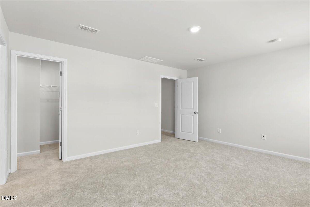 1387 Hasse Avenue Apex, NC 27502 - Photo 17 of 27 a view of an empty room