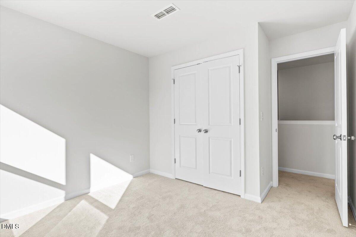 1387 Hasse Avenue Apex, NC 27502 - Photo 20 of 27 a view of an empty room