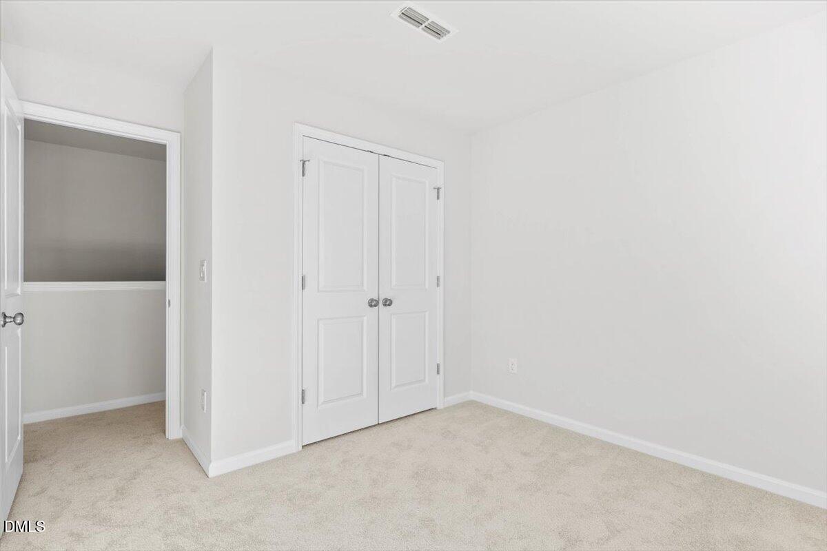 1387 Hasse Avenue Apex, NC 27502 - Photo 22 of 27 a view of an empty room