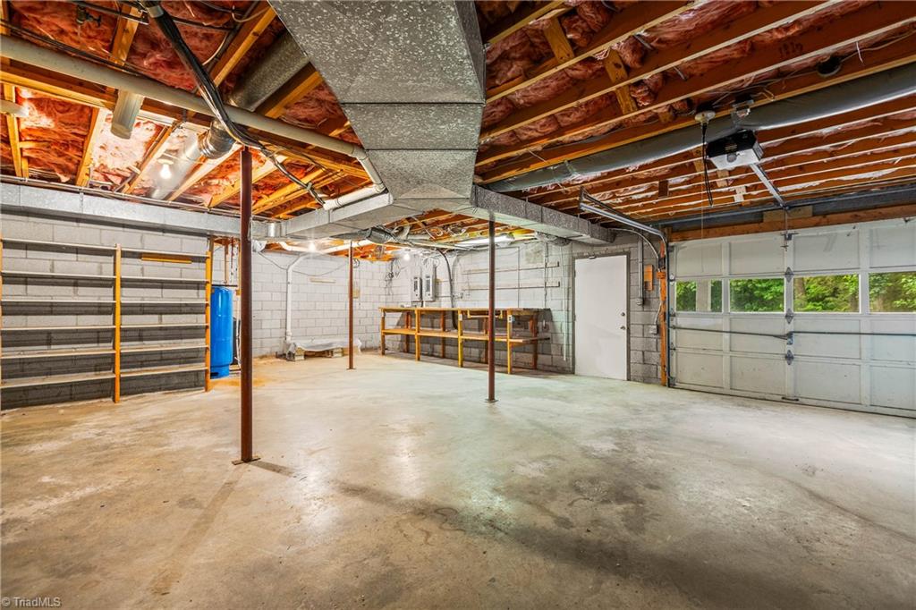 4200 Clinard Road Clemmons, NC 27012 - Photo 45 of 49 Basement garage, workshop and storage