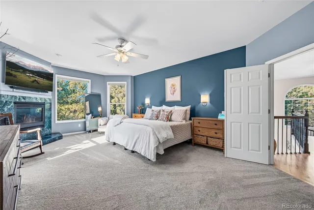 a bathroom with a sink a mirror and a shower