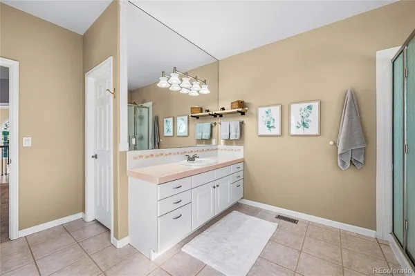 a bathroom with a bathtub and a window