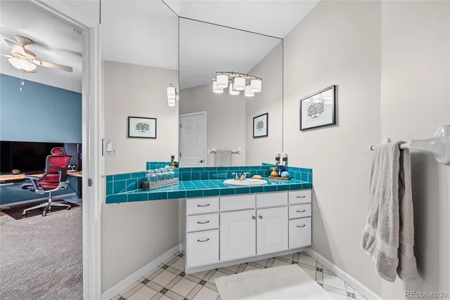 a bathroom with a toilet and a bathtub