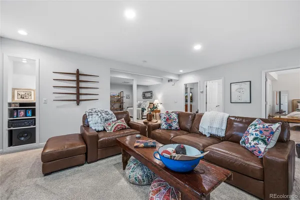 a bedroom with furniture and a couch