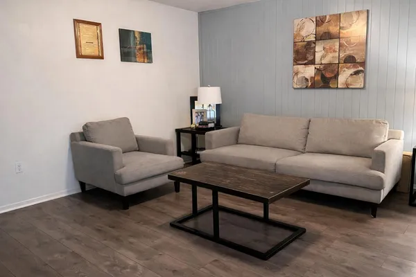 a living room with furniture and a couch