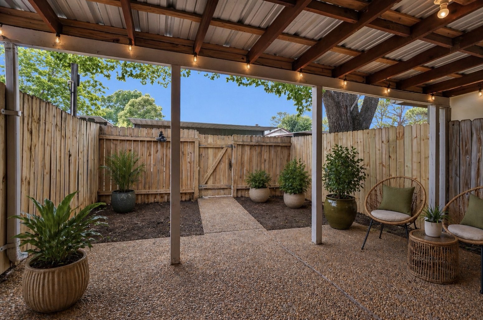 9541 Clanton Street Houston, TX 77080 - Photo 39 of 44 a backyard with furniture and wooden fence