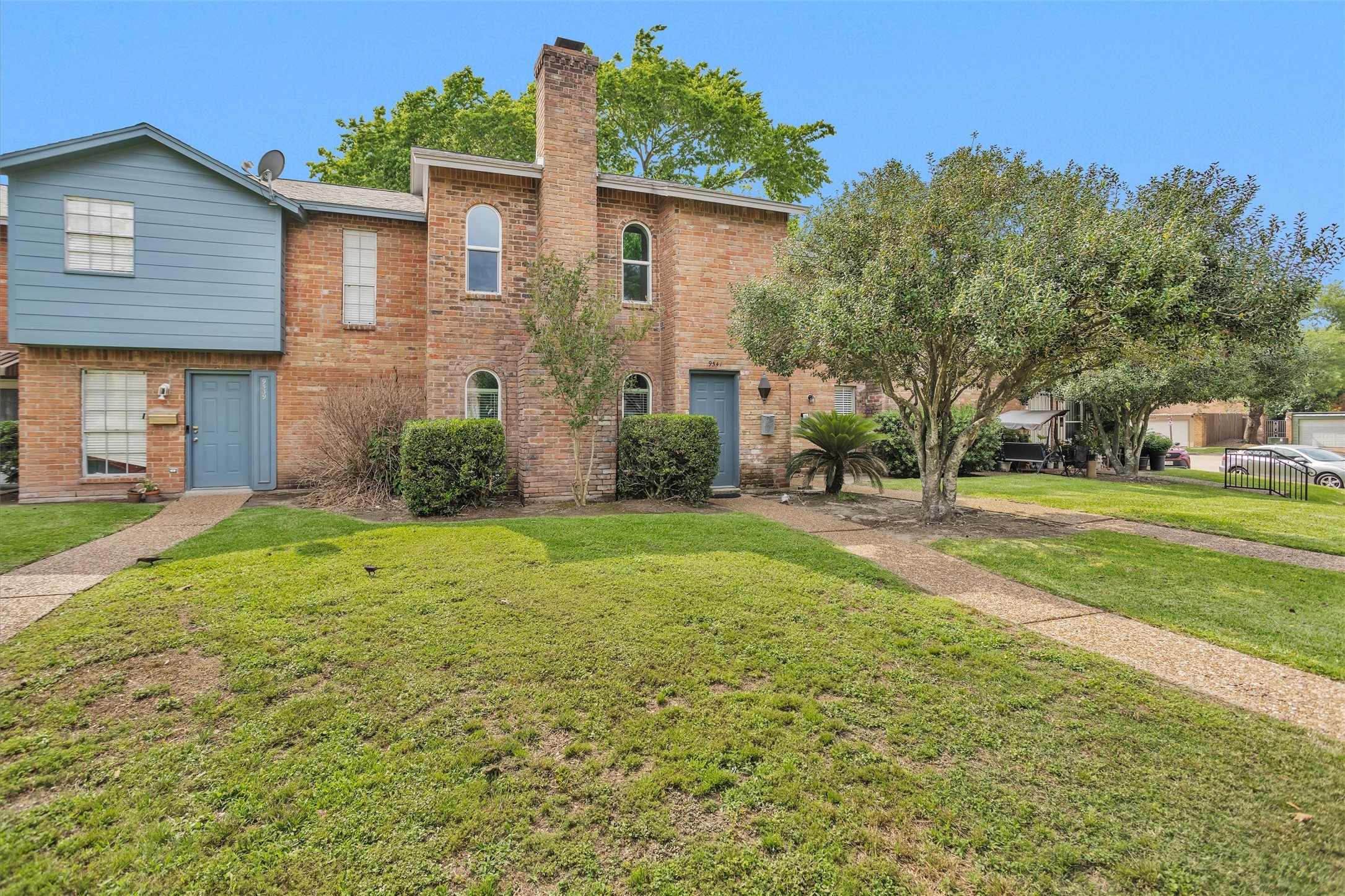 9541 Clanton Street Houston, TX 77080 - Photo 4 of 44 a view of a house with backyard and trees