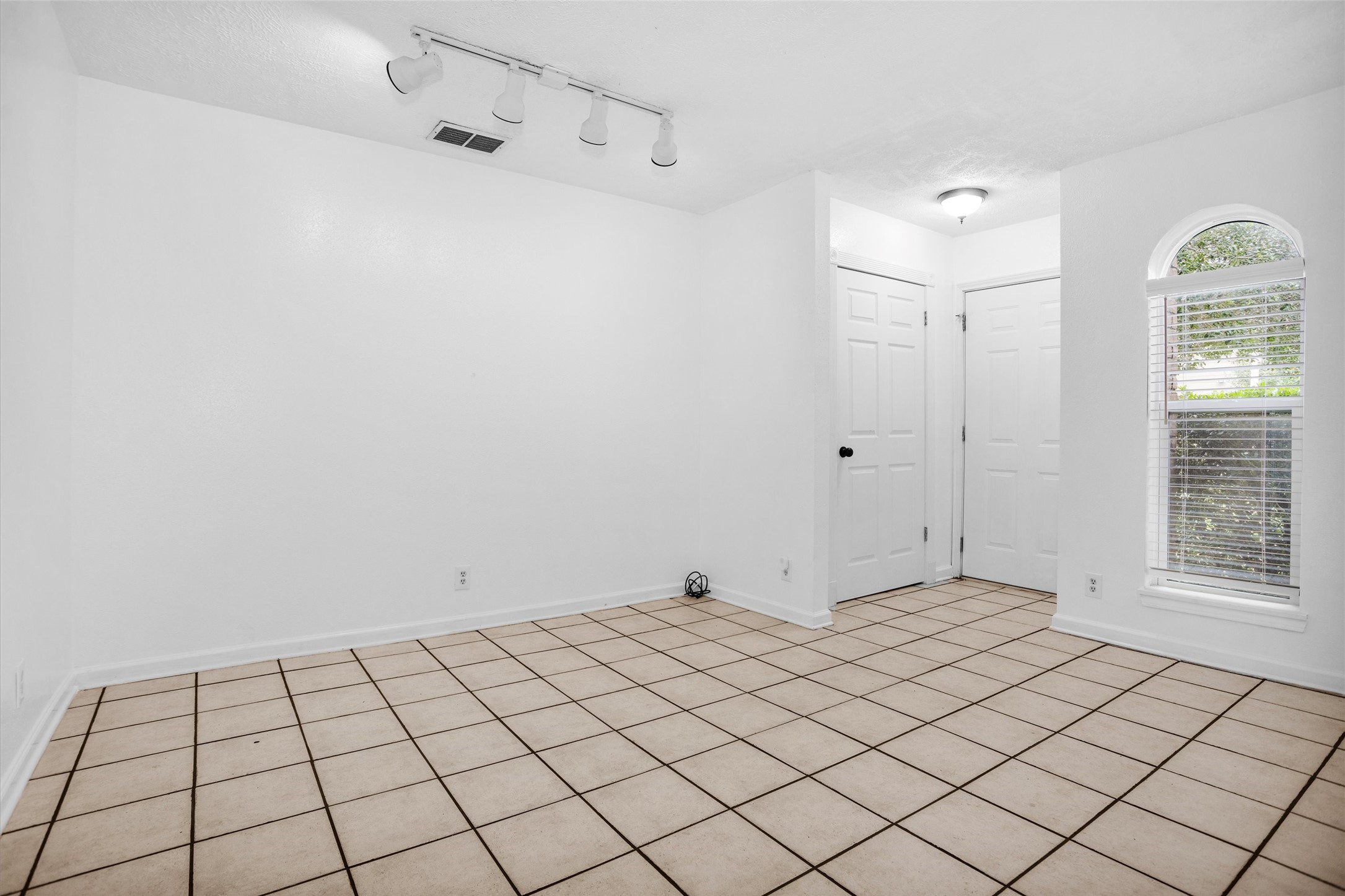 9541 Clanton Street Houston, TX 77080 - Photo 10 of 44 a view of an empty room