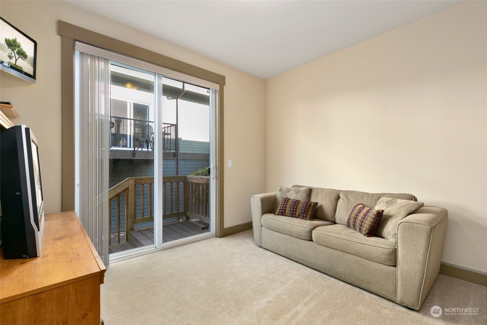 2115 201st Place Southeast, Unit B3 Bothell, WA 98012 - Photo 12 of 25 a living room with a couch and a large window