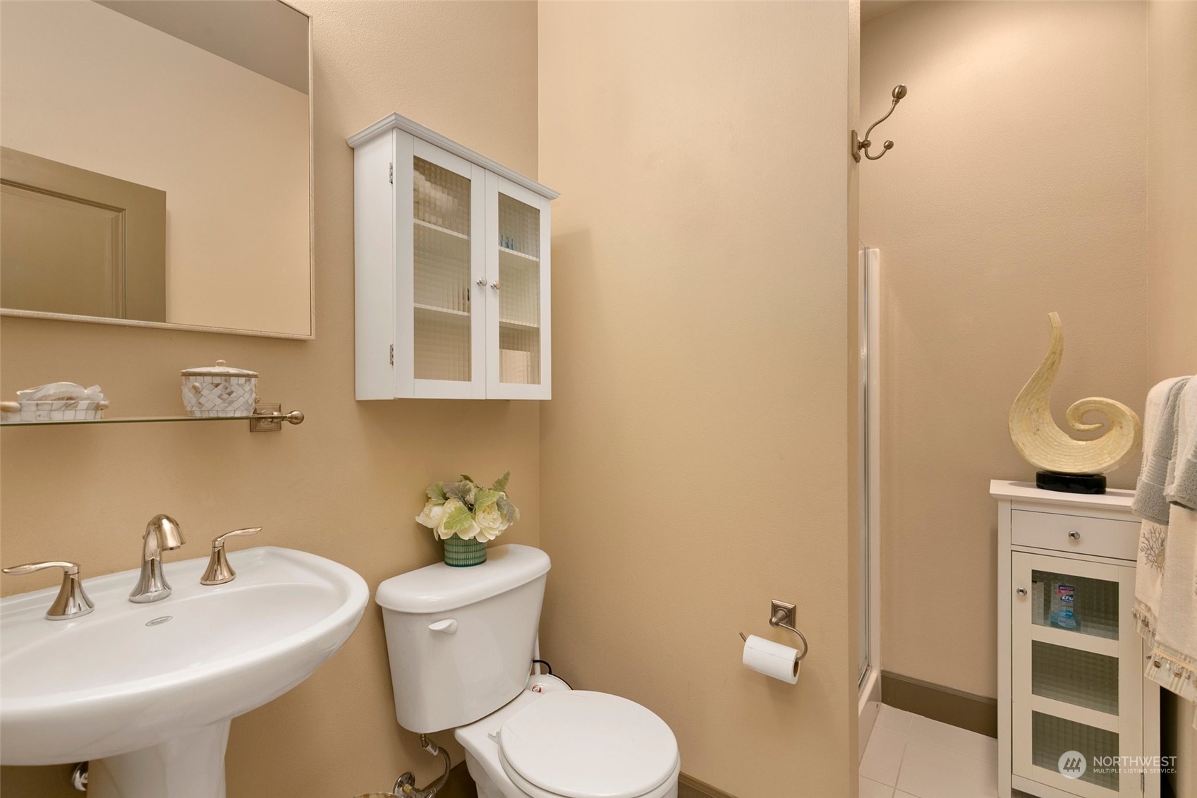 2115 201st Place Southeast, Unit B3 Bothell, WA 98012 - Photo 14 of 25 a bathroom with a toilet a sink and mirror