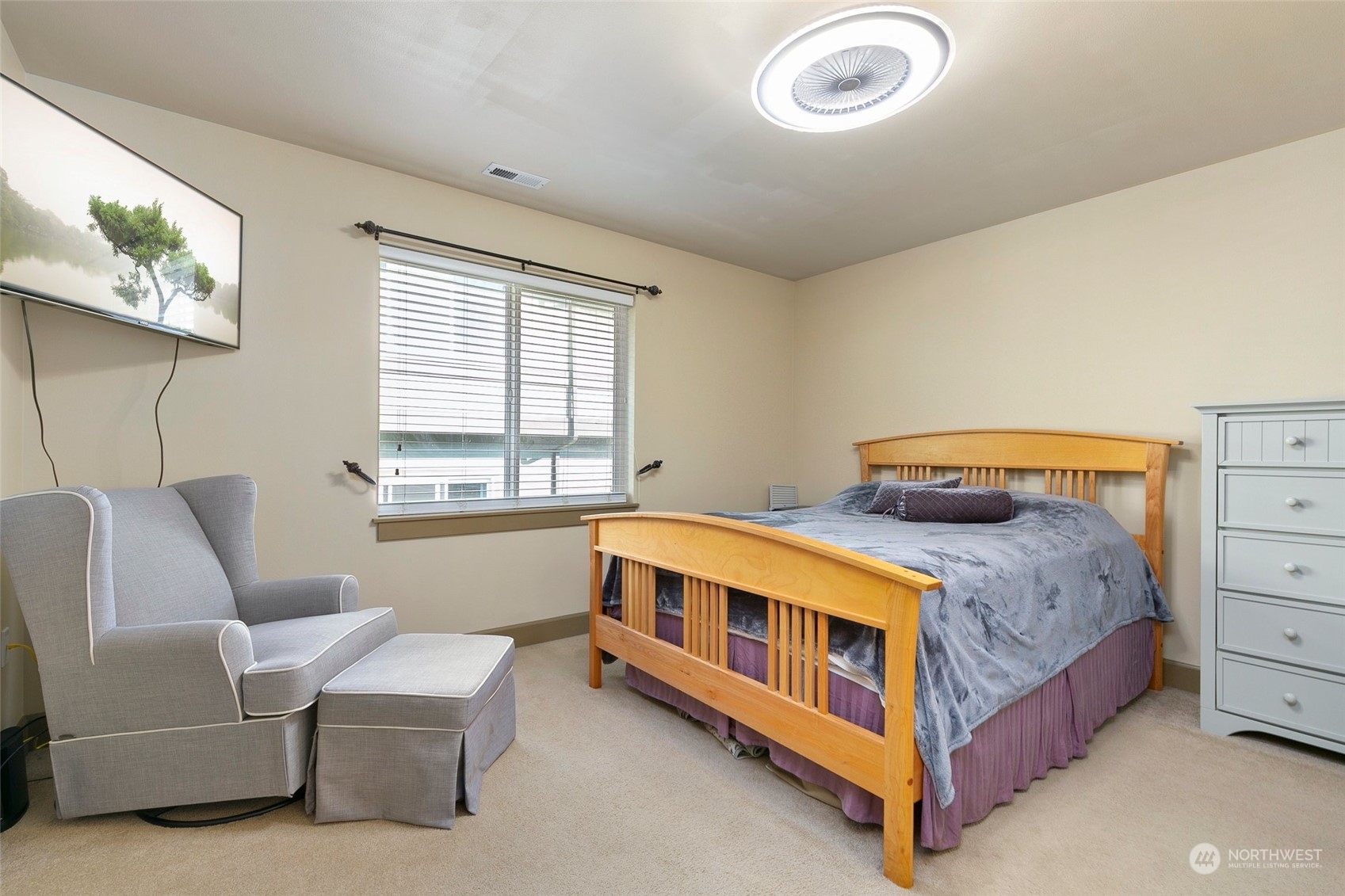2115 201st Place Southeast, Unit B3 Bothell, WA 98012 - Photo 21 of 25 a bedroom with a bed and a window