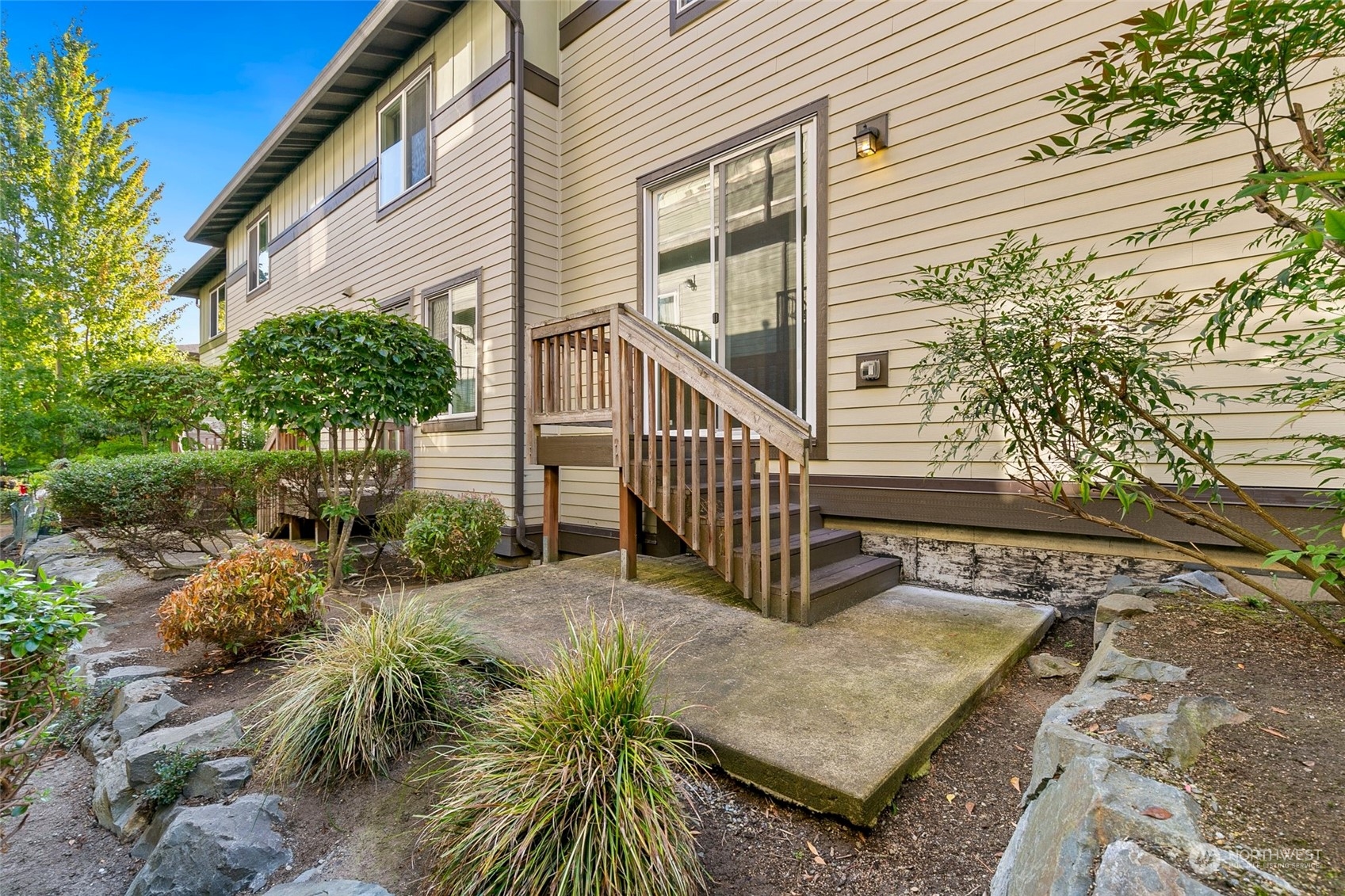 2115 201st Place Southeast, Unit B3 Bothell, WA 98012 - Photo 24 of 25 a view of a house with backyard and sitting area